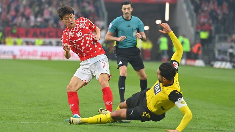 Die Grätsche, die Emre Cans Arbeitstag früh beendet.