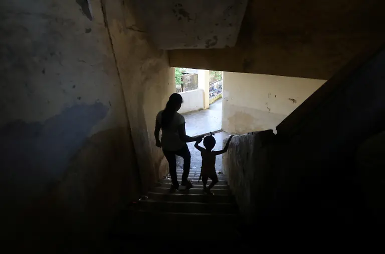 2023-08-03T103429Z-1711983842-RC2NXW9BSNIB-RTRMADP-3-INDIA-MONSOON-DILAPIDATED-BUILDINGS