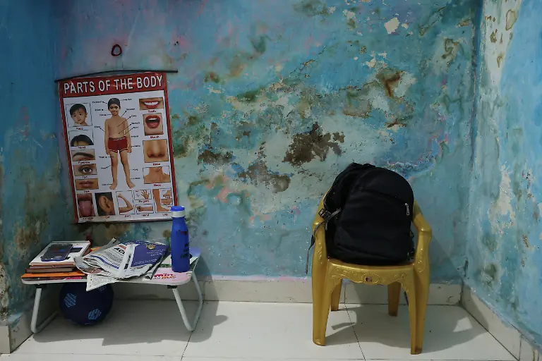 2023-08-03T103352Z-2118116925-RC2540ALYLV8-RTRMADP-3-INDIA-MONSOON-DILAPIDATED-BUILDINGS