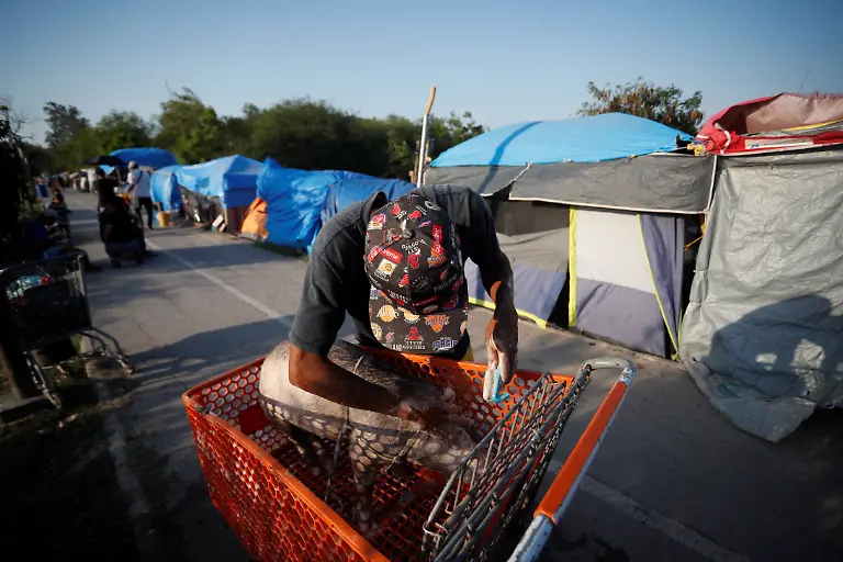 2023-07-06T101023Z-1748818170-RC2MM1A9O0SY-RTRMADP-3-USA-IMMIGRATION-ASYLUM-BORDER