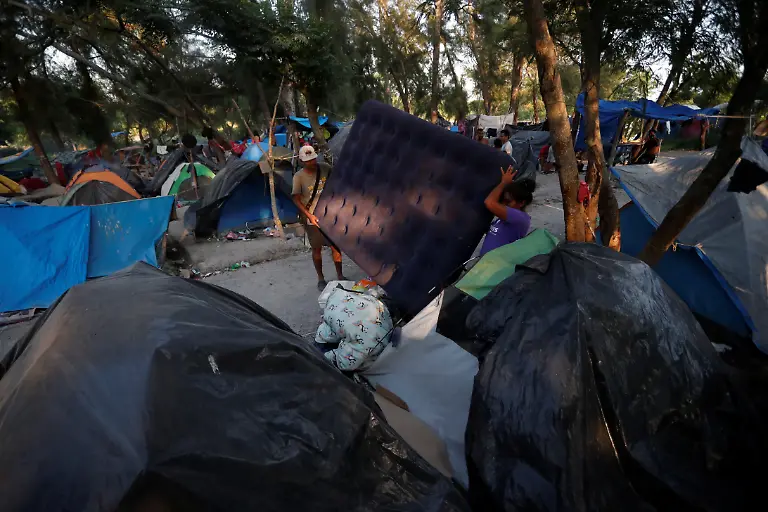 2023-07-06T101028Z-1708268060-RC2AN1ADK568-RTRMADP-3-USA-IMMIGRATION-ASYLUM-BORDER