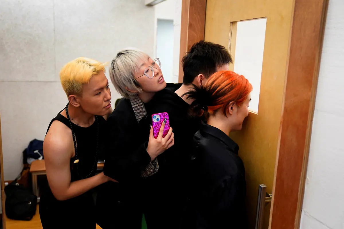 2023-06-22T233059Z-1097116062-RC2DW0ANU1XU-RTRMADP-3-CHINA-CULTURE-VOGUING