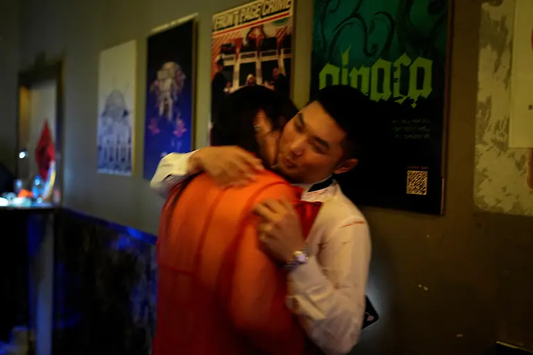 2023-06-22T233108Z-377974467-RC2PX0AGOKYW-RTRMADP-3-CHINA-CULTURE-VOGUING