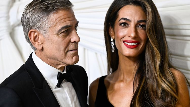 Sind offenbar ein sehr harmonisches Paar: George und Amal Clooney.