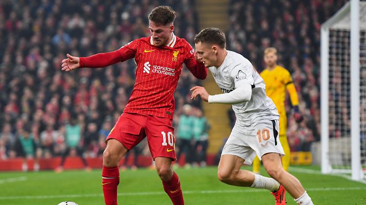 Es kann nur eine Nummer 10 geben. Auch beim englischen Meister Liverpool. Hier sehen Sie die beiden Kandidaten. Es sind Weltmeister Mac Allister und DFB-Star Wirtz.