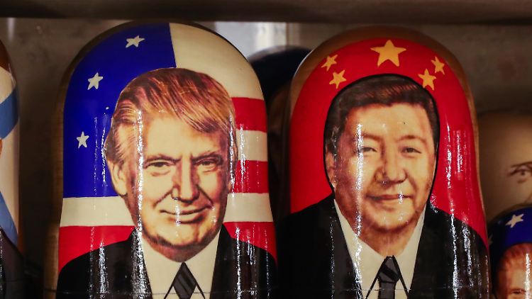 Wirtschaftliche Konkurrenten: Xi und Trump, hier in einer künstlerischen Darstellung auf Matrjoschkas.