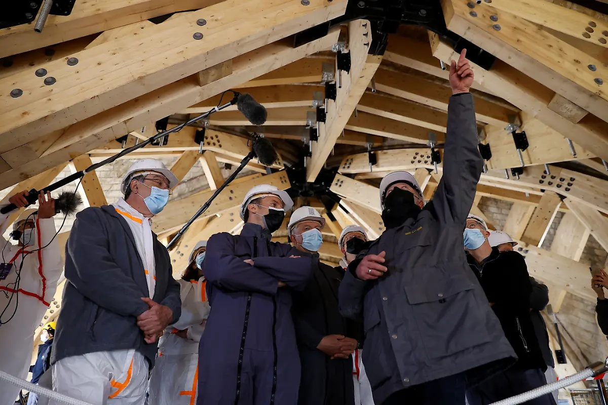 2021-04-15T111851Z-1747953789-RC2BWM95T2JT-RTRMADP-3-FRANCE-NOTREDAME-MACRON