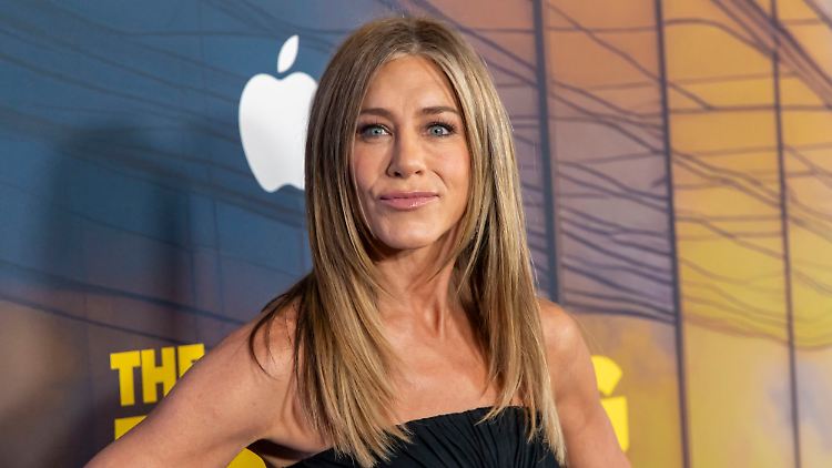 Schon im Sommer wirkten Jennifer Aniston und Jim Curtis sehr vertraut.