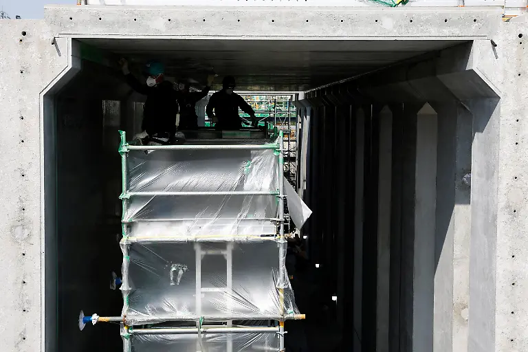 2023-03-09T230128Z-1866636022-RC2FPZ9HP7QE-RTRMADP-3-JAPAN-FUKUSHIMA-WATER-FISH