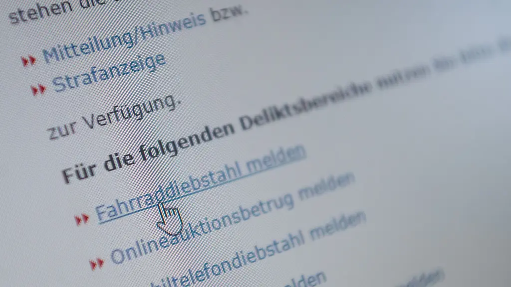 Der-Mauszeiger-steht-auf-der-Webseite-einer-Onlinewache-auf-dem-Link-Fahrraddiebstahl-melden