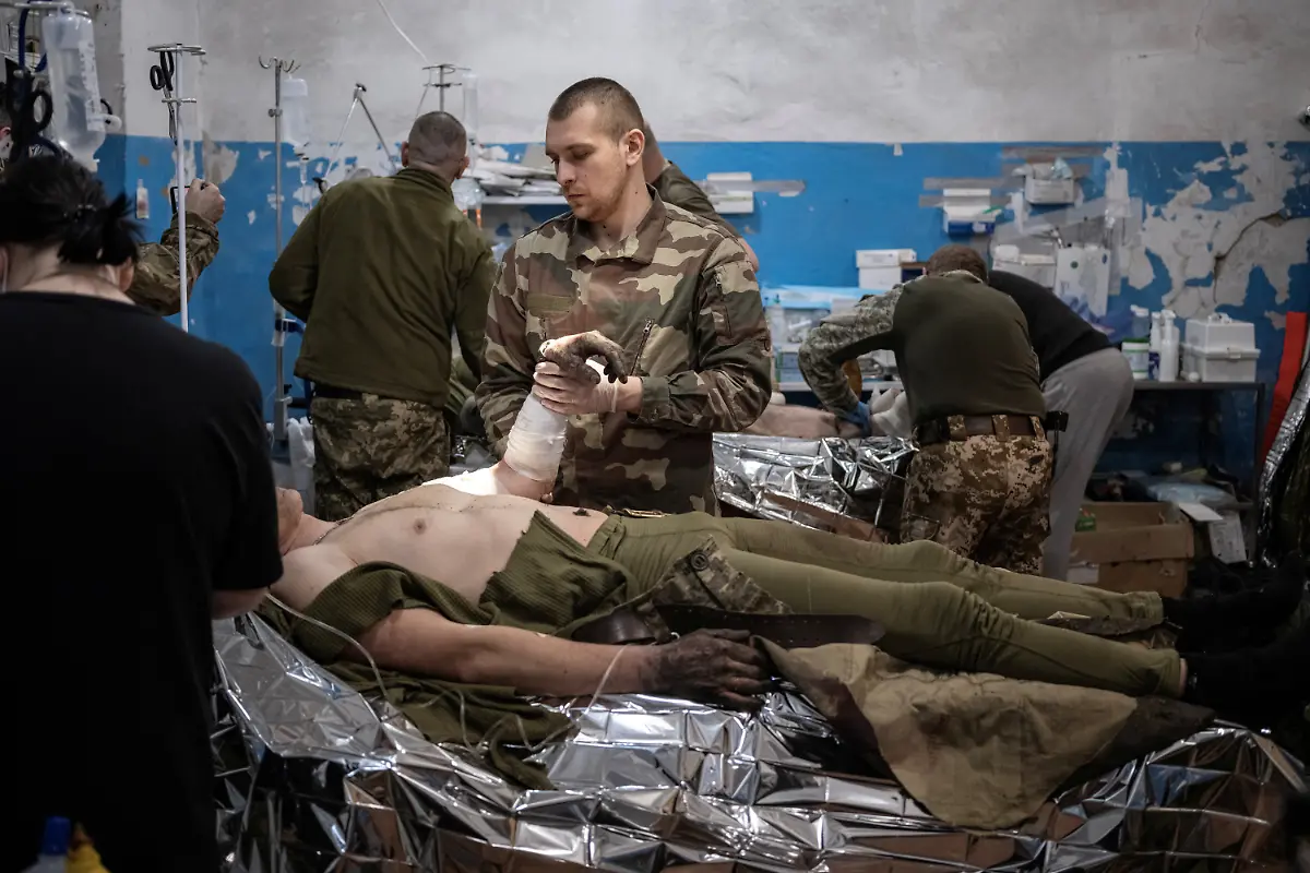 2023-02-21T080115Z-823656894-RC2BEZ9PBLUM-RTRMADP-3-UKRAINE-CRISIS-FRONTLINE-MEDICS