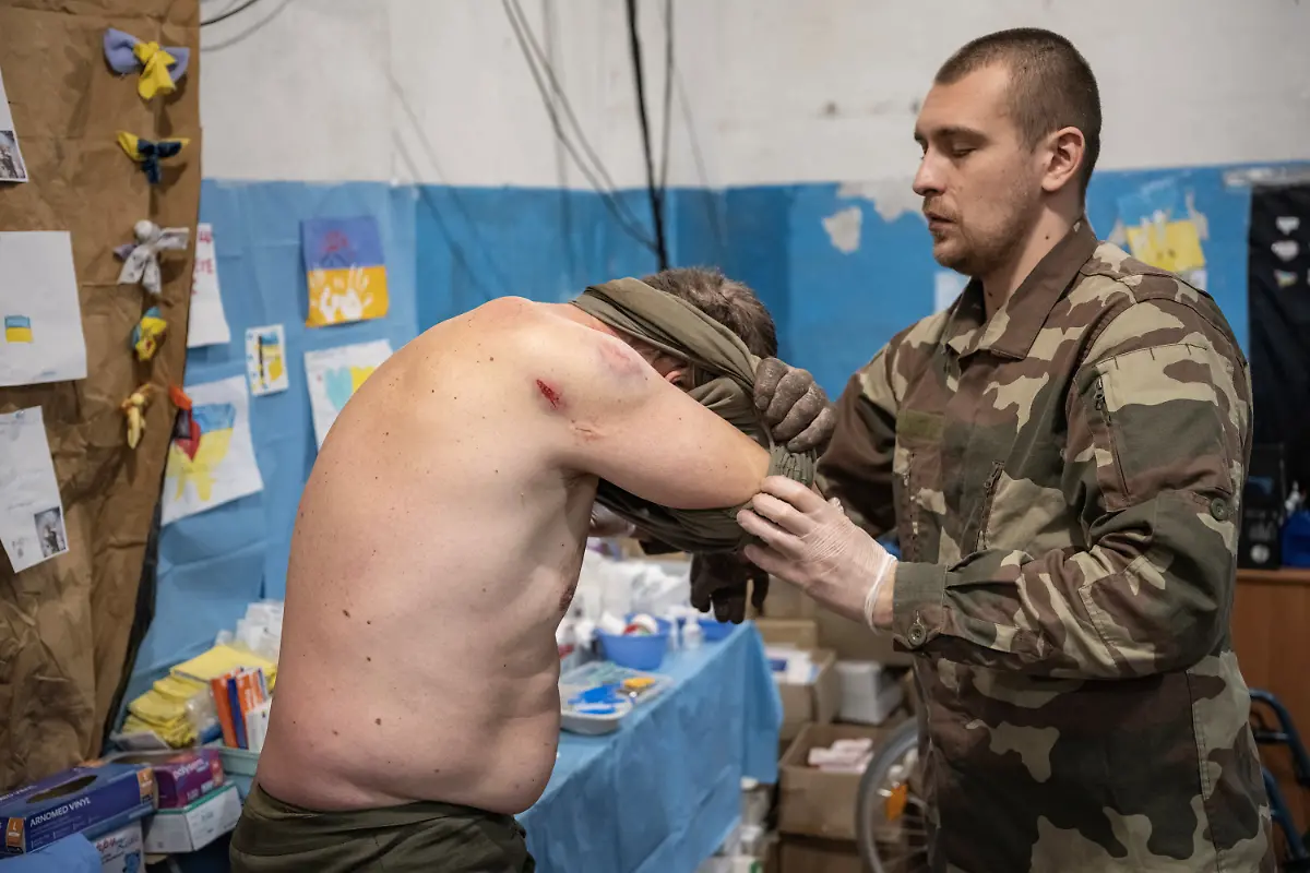 2023-02-21T080117Z-1994604840-RC2CEZ9ILJHS-RTRMADP-3-UKRAINE-CRISIS-FRONTLINE-MEDICS