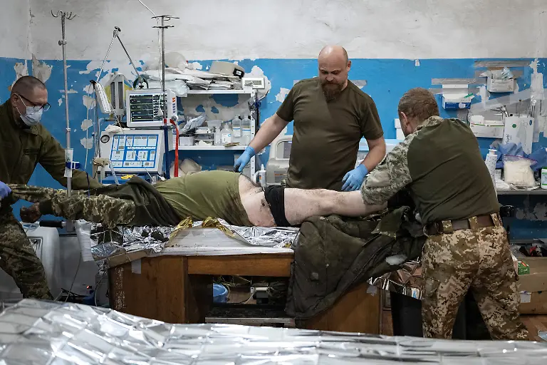 2023-02-21T080122Z-92217334-RC2BEZ9KRX1B-RTRMADP-3-UKRAINE-CRISIS-FRONTLINE-MEDICS