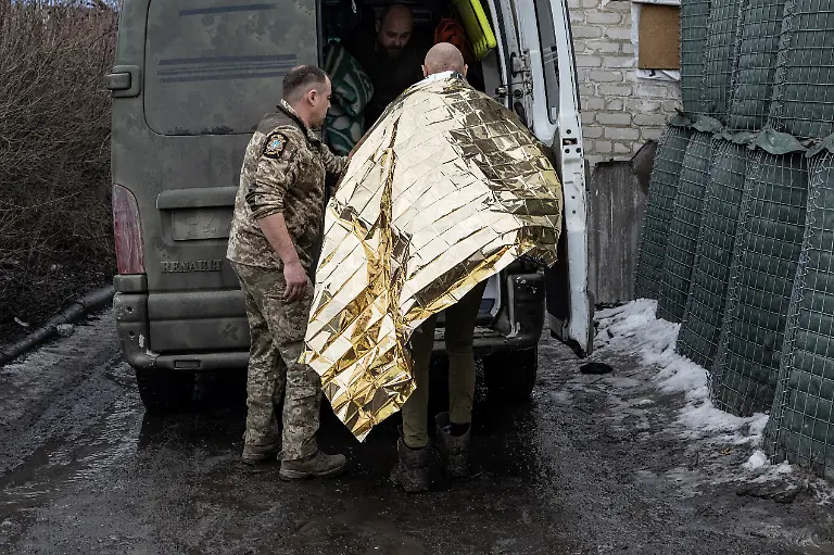 2023-02-21T080130Z-761947010-RC2CEZ9FN8AC-RTRMADP-3-UKRAINE-CRISIS-FRONTLINE-MEDICS