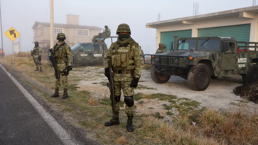 2023-01-07T181936Z-1721679196-RC2PLY9E2A0C-RTRMADP-3-MEXICO-VIOLENCE