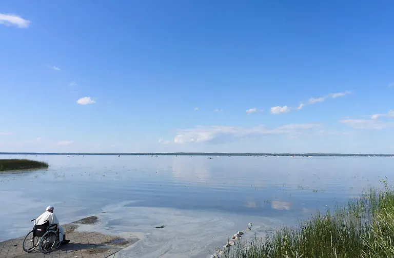 2022-07-27T015001Z-400091989-RC20KV93IYYB-RTRMADP-3-POPE-CANADA