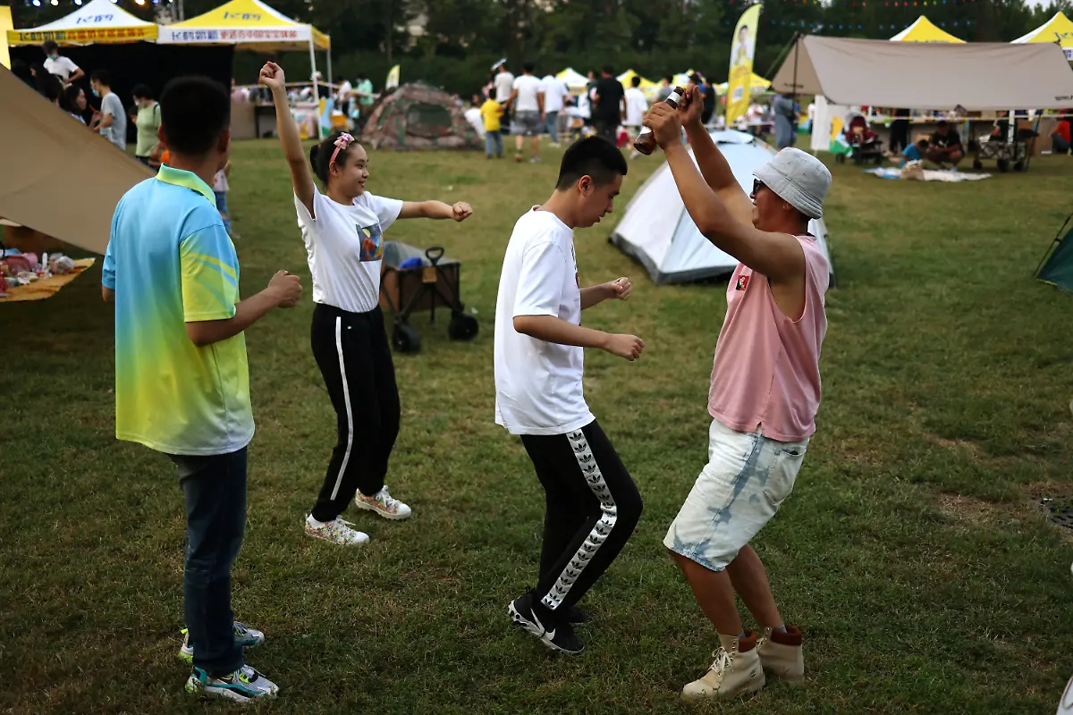 2022-12-02T030253Z-1007055811-RC2XEW9NRLS4-RTRMADP-3-CHINA-AUTISM-BAND