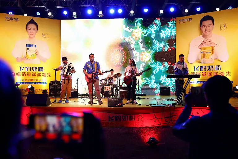 2022-12-02T030312Z-634604167-RC20FW9DTV76-RTRMADP-3-CHINA-AUTISM-BAND