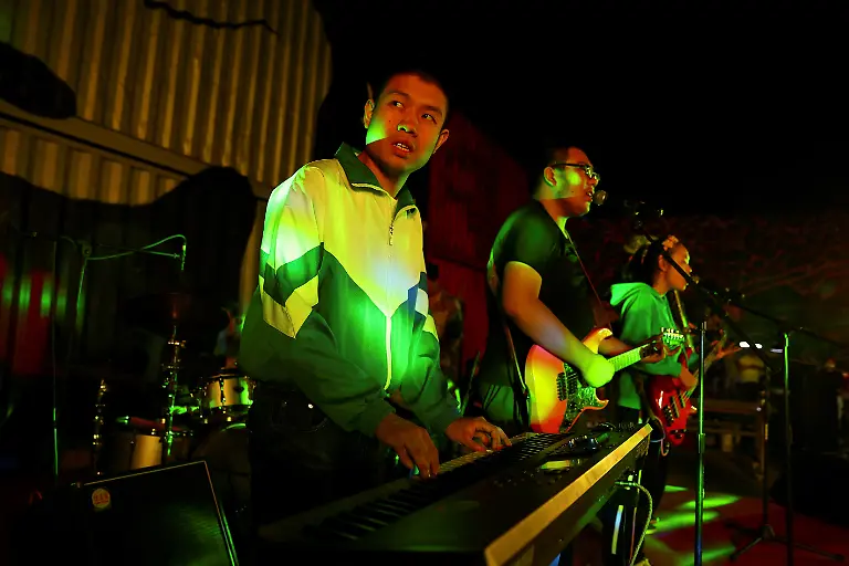 2022-12-02T030315Z-629779744-RC2MNW9GNRK2-RTRMADP-3-CHINA-AUTISM-BAND