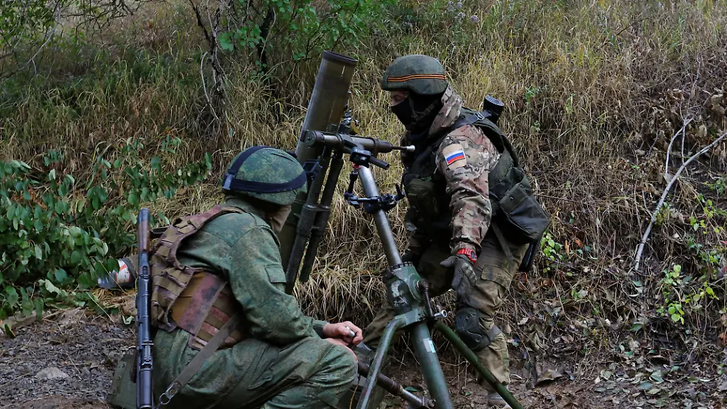 2022-09-17T141437Z-1667158019-RC2SIW945I8A-RTRMADP-3-UKRAINE-CRISIS-DONETSK