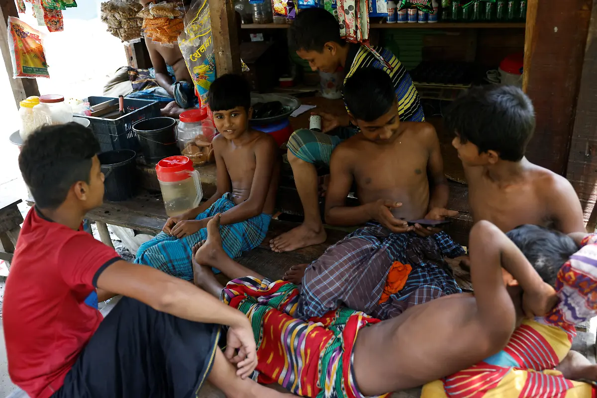 2022-10-19T230127Z-1566458008-RC2UYV9XO4JX-RTRMADP-3-CLIMATE-CHANGE-BANGLADESH-FARMS