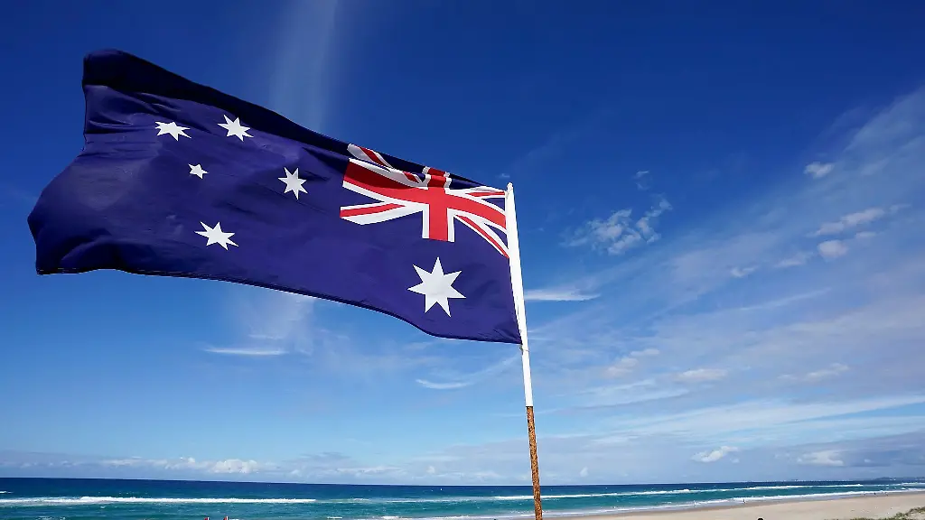 Die-australische-Flagge-an-einem-Strand-Symbolbild
