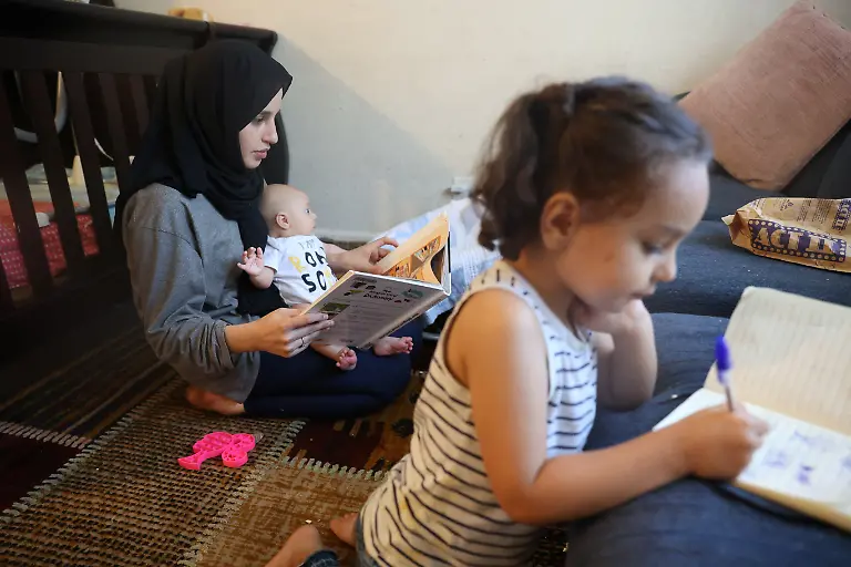 2022-08-11T100103Z-133263783-RC2NAV9UDT03-RTRMADP-3-AFGHANISTAN-CONFLICT-ANNIVERSARY-IMMIGRANT