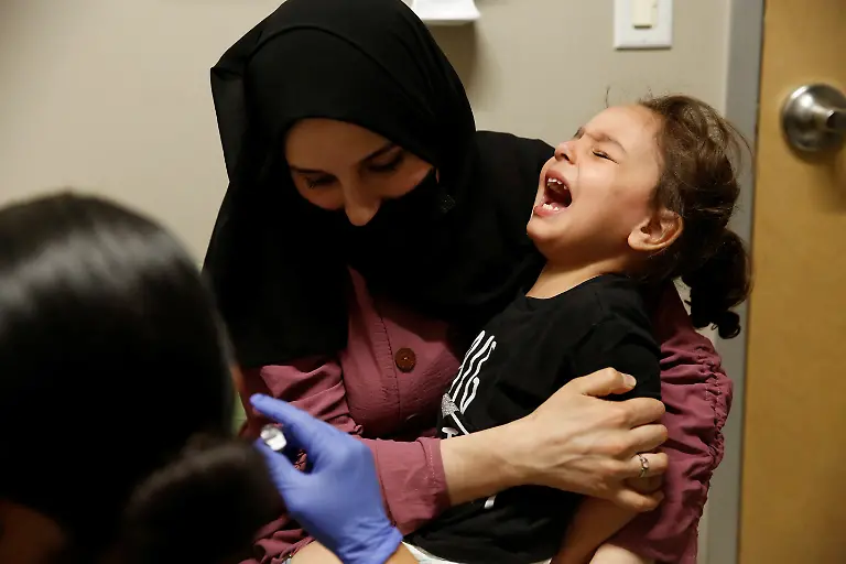 2022-08-11T100049Z-467642205-RC2EMT9YFT64-RTRMADP-3-AFGHANISTAN-CONFLICT-ANNIVERSARY-IMMIGRANT