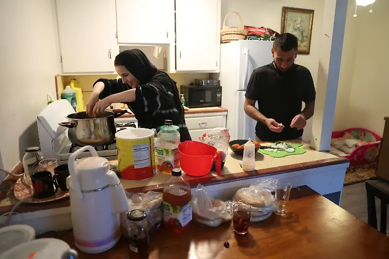 2022-08-11T100040Z-1299744347-RC2Q6U9KOI1J-RTRMADP-3-AFGHANISTAN-CONFLICT-ANNIVERSARY-IMMIGRANT