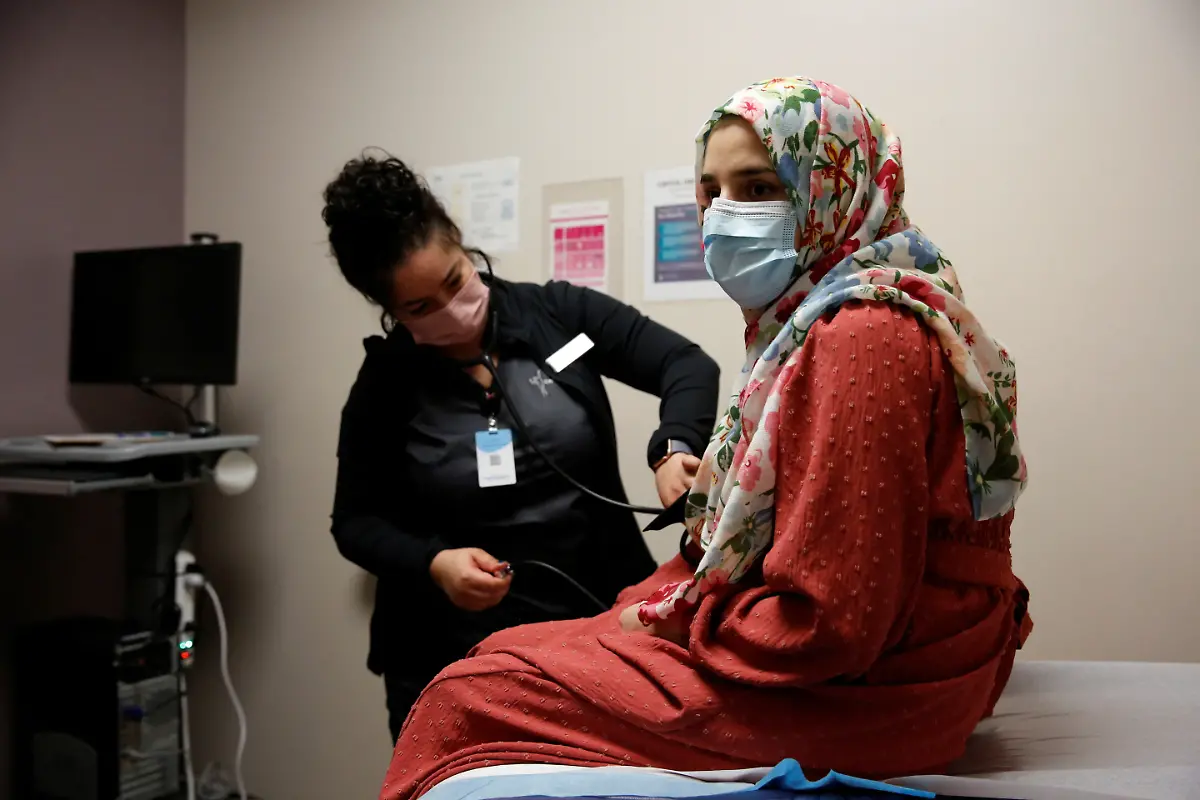 2022-08-11T100054Z-1229488090-RC2MNR9EBFP7-RTRMADP-3-AFGHANISTAN-CONFLICT-ANNIVERSARY-IMMIGRANT