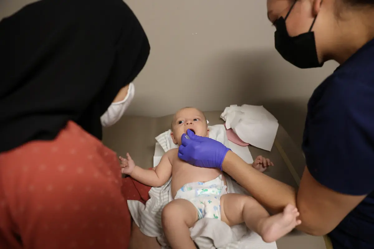 2022-08-11T100056Z-718489941-RC2NGV9QHDHS-RTRMADP-3-AFGHANISTAN-CONFLICT-ANNIVERSARY-IMMIGRANT