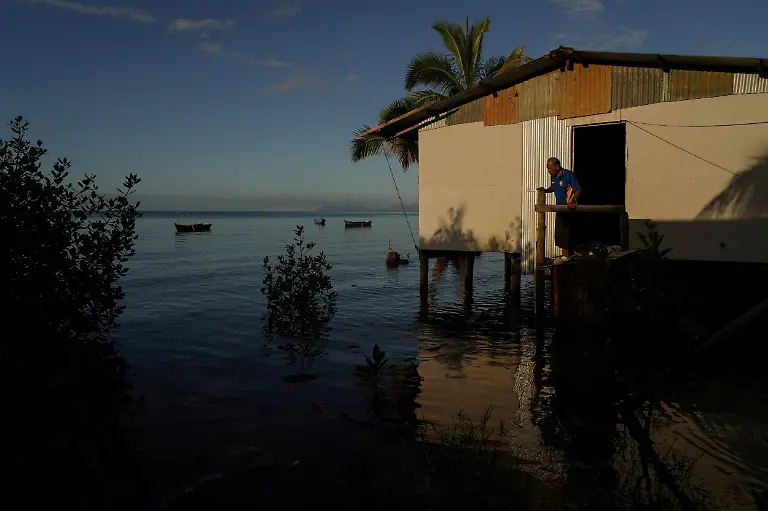 Local-resident-Rapuma-Tuqio-high-tide-in-Veivatuloa-Village