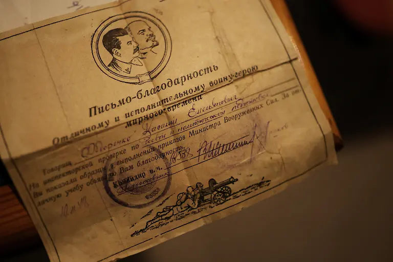 2022-08-02T120752Z-905056040-RC2NHV958OUC-RTRMADP-3-UKRAINE-CRISIS-KHARKIV-GRANDMOTHER