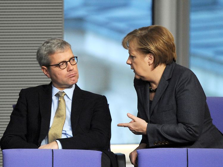 Geben in der E10-Debatte keine gute Figur ab: Norbert Röttgen und Angela Merkel.
