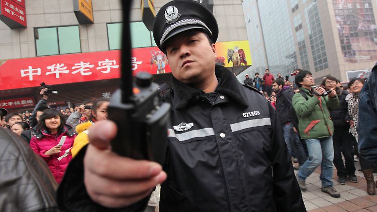 Der chinesische Volkskongress ist froh, über den hohen Polizeischutz.