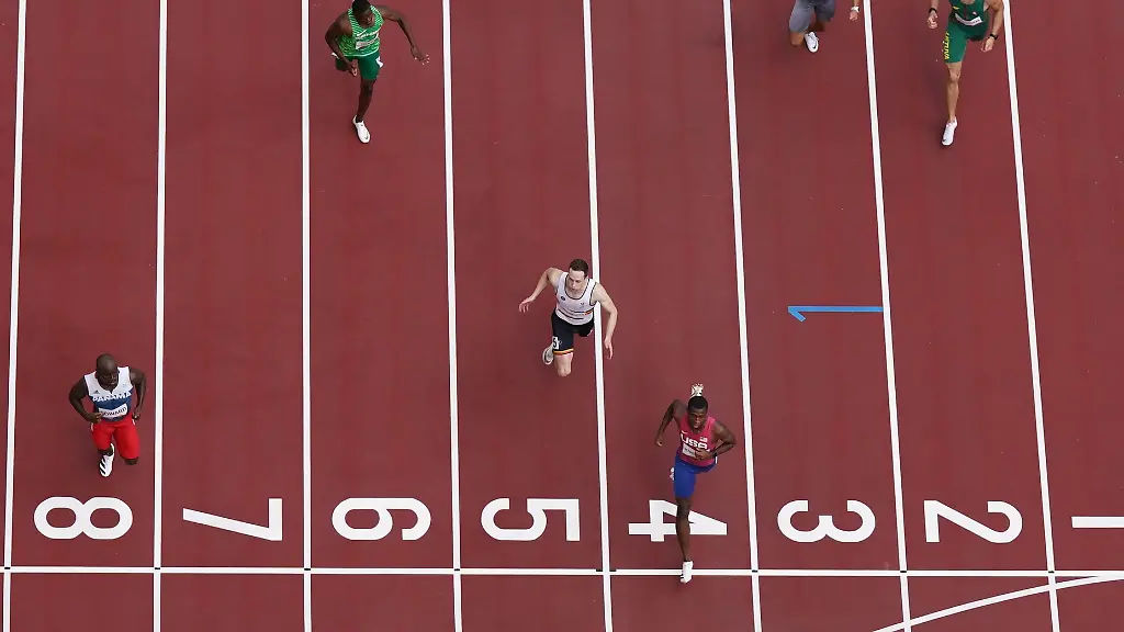 2021-08-03T023516Z-1712908059-SP1EH83076O0K-RTRMADP-3-OLYMPICS-2020-ATH-M-200M-RND1