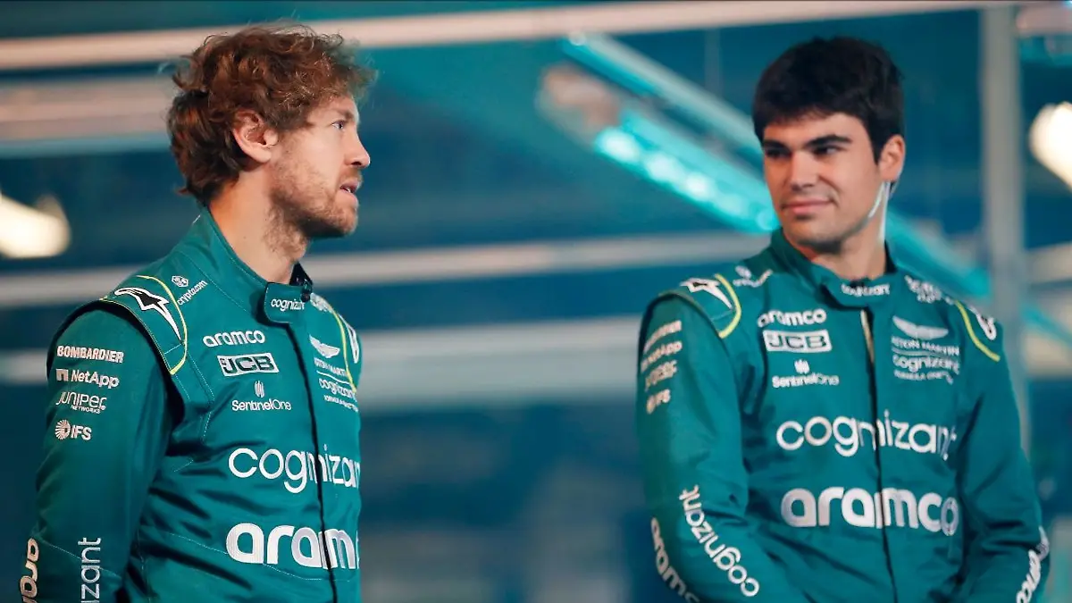 Sebastian-Vettel-l-und-Lance-Stroll-bei-der-Vorstelltung-des-neuen-Rennwagens-von-Aston-Martin