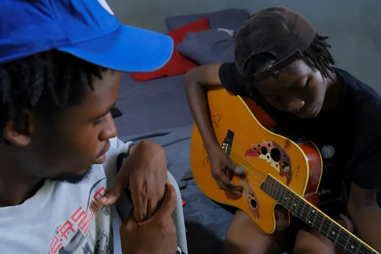 2022-03-24T090212Z-1920614918-RC2EOS9S110L-RTRMADP-3-GHANA-SKATEBOARDING