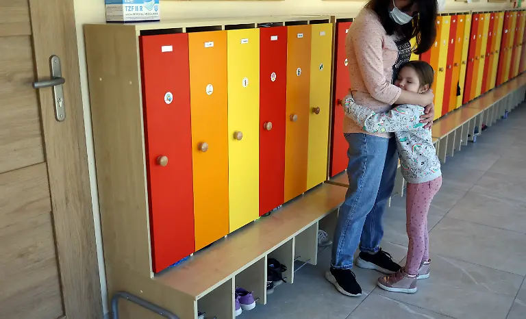 2022-03-24T102805Z-1978094980-RC2A8T9AEZ5J-RTRMADP-3-UKRAINE-CRISIS-POLAND-MONASTERY-CHILDREN