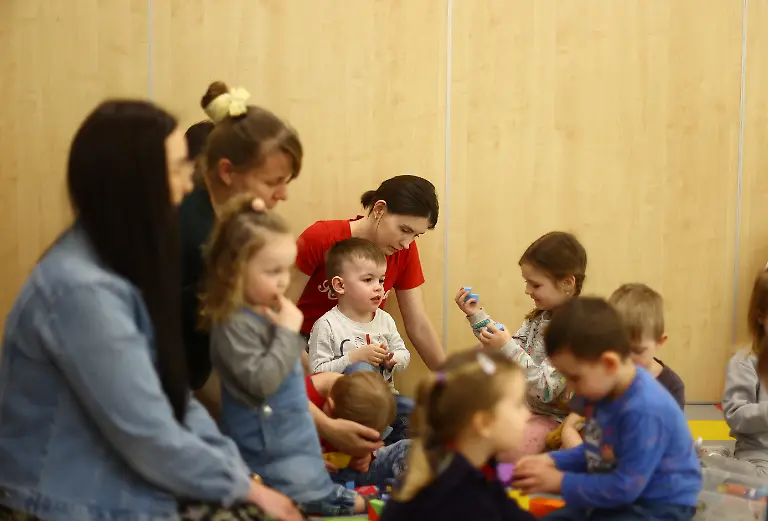 2022-03-24T102804Z-1083087330-RC2A8T955HML-RTRMADP-3-UKRAINE-CRISIS-POLAND-MONASTERY-CHILDREN