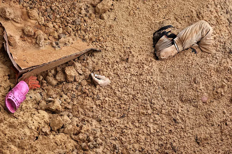 2022-04-02T183838Z-1103620409-RC22FT9J3P7W-RTRMADP-3-UKRAINE-CRISIS-BUCHA-BODIES