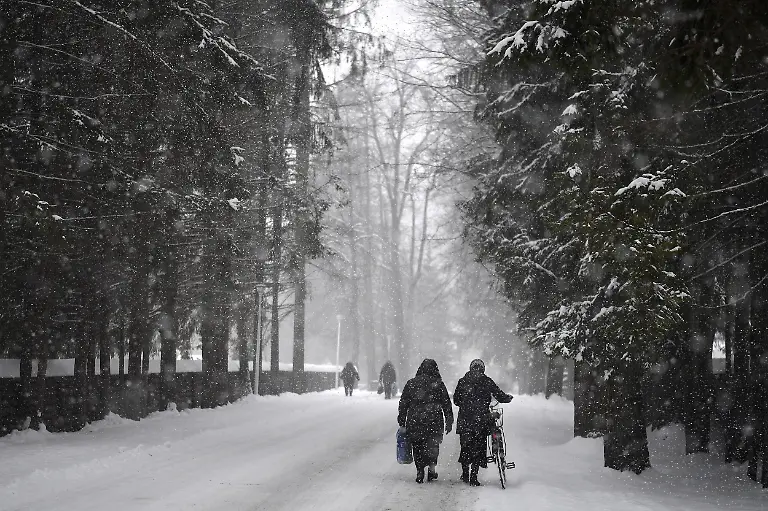 2022-03-08T000000Z-1974501737-RC2EYS9BPZG4-RTRMADP-3-UKRAINE-CRISIS-ROMANIA-MONASTERY