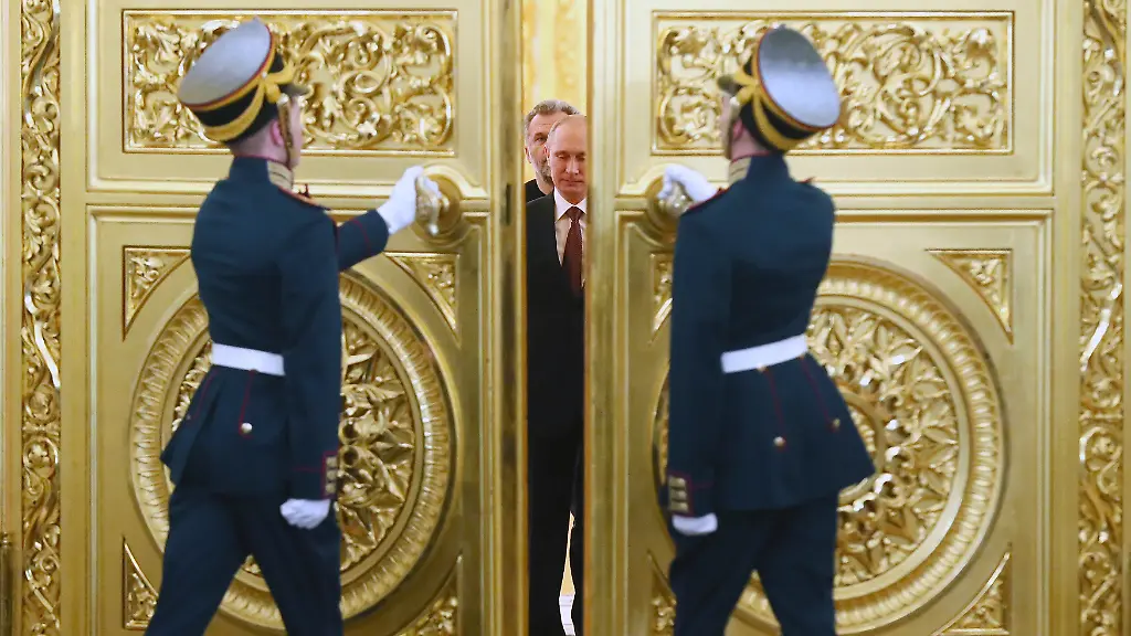 2014-03-18T000000Z-453508168-GM1EA3I1O2X01-RTRMADP-3-UKRAINE-CRISIS-PUTIN-TREATY-1