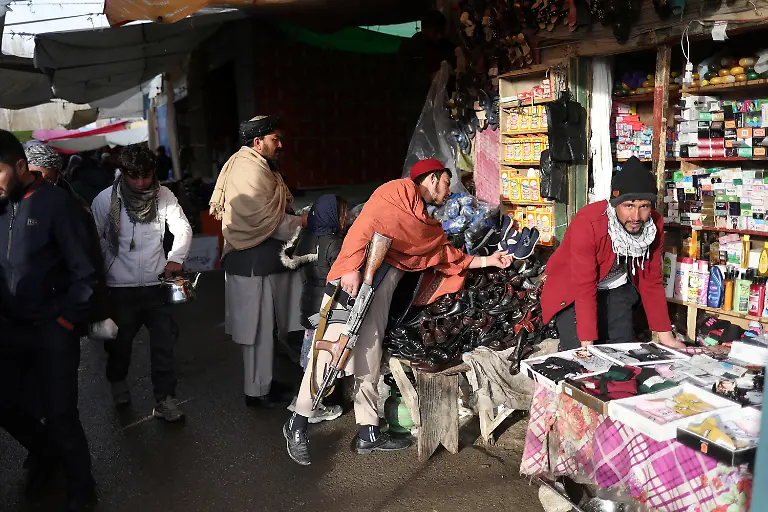 2021-12-30T060033Z-1374941859-RC2OJR9FC1W9-RTRMADP-3-AFGHANISTAN-CONFLICT-WINTER