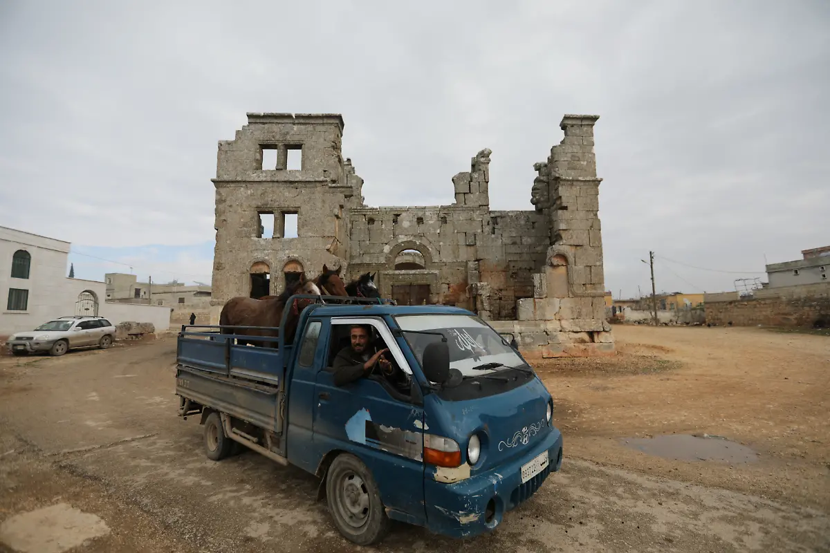 2021-12-22T100029Z-1728487594-RC2D2R9U0BEI-RTRMADP-3-SYRIA-SECURITY-RUINS-DISPLACED