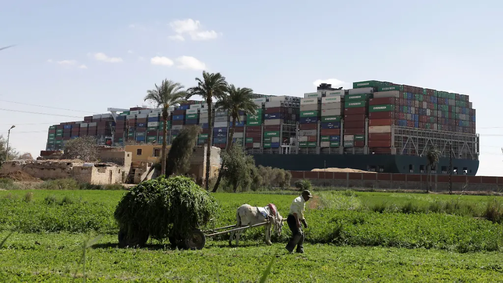 2021-03-27T091759Z-1726655904-RC2LJM90WXP2-RTRMADP-3-EGYPT-SUEZCANAL-SHIP