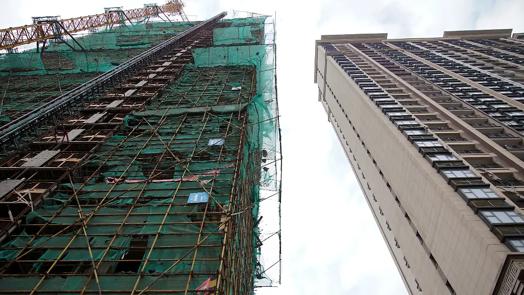 2021-10-22T101957Z-1196981960-RC2UEQ9ASF1M-RTRMADP-3-CHINA-EVERGRANDE-DEBT