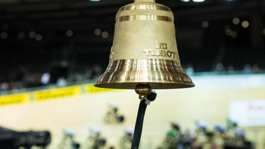 Die-Glocke-zum-Einlaeuten-der-letzten-Runde-mit-der-Aufschrift-Tissot