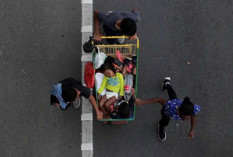 2021-11-29T125716Z-236402911-RC2ULQ9BOW7T-RTRMADP-3-GLOBAL-POY-2021