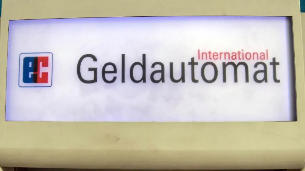 Der-Schriftzug-Geldautomat-auf-einem-Geldautomaten